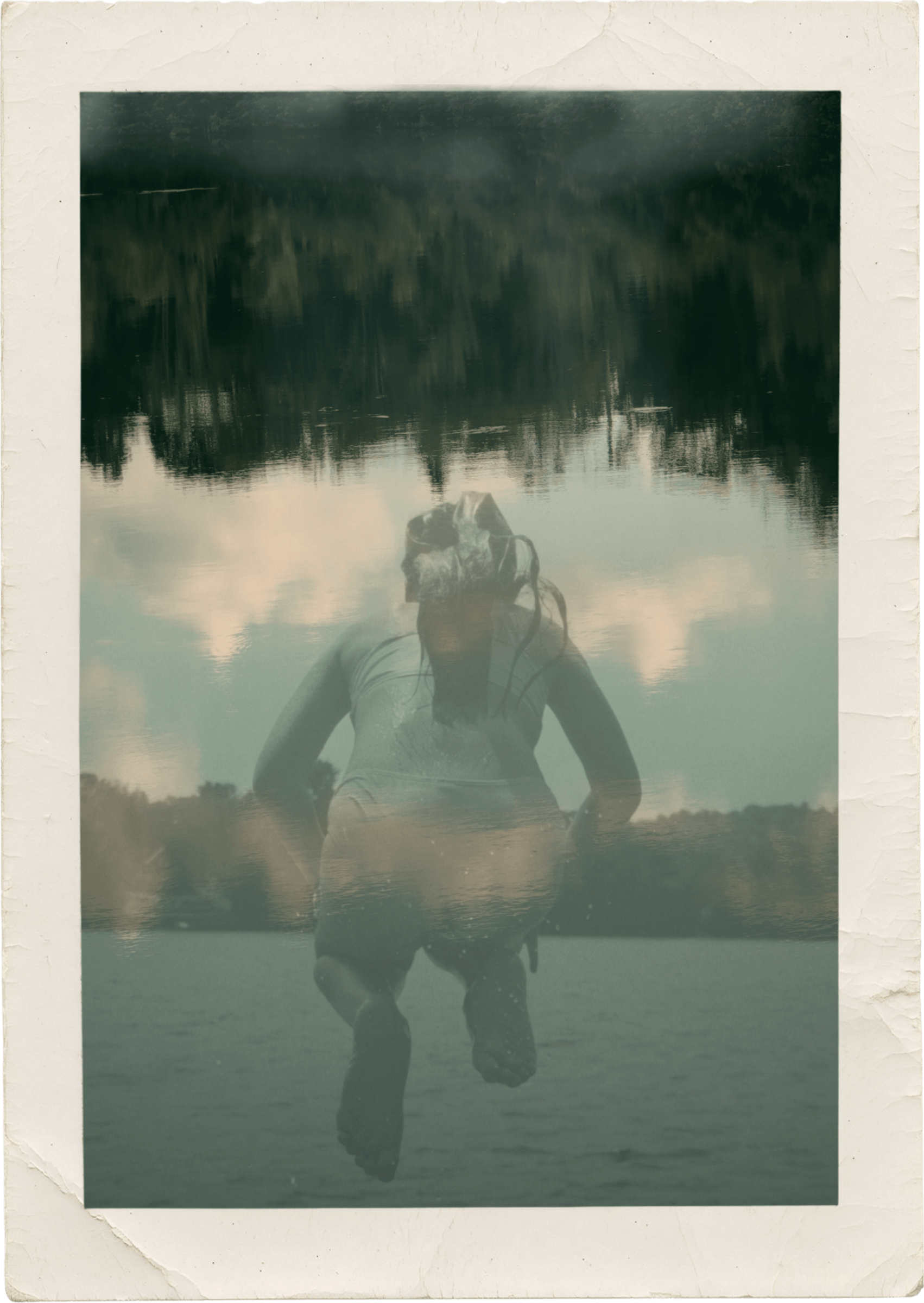 young girle jumping in a lake